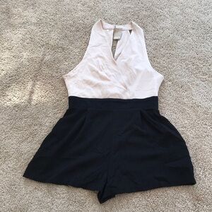 New! Odica large cream/ black combo romper .